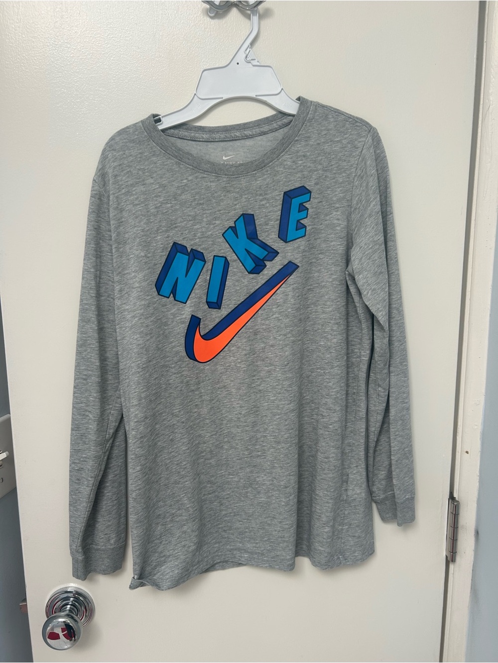Nike Gray Long Sleeve Tee with Blue Block Letters & Orange Swoosh